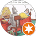 A cartoon of the Tin Man at a dinner table with hay and oil cans, as a woman and girl look on. The Tin Man says, “I love this party.” An orange star badge with a white check mark appears in the corner—perfect for a Denton Texas chiropractor ad.